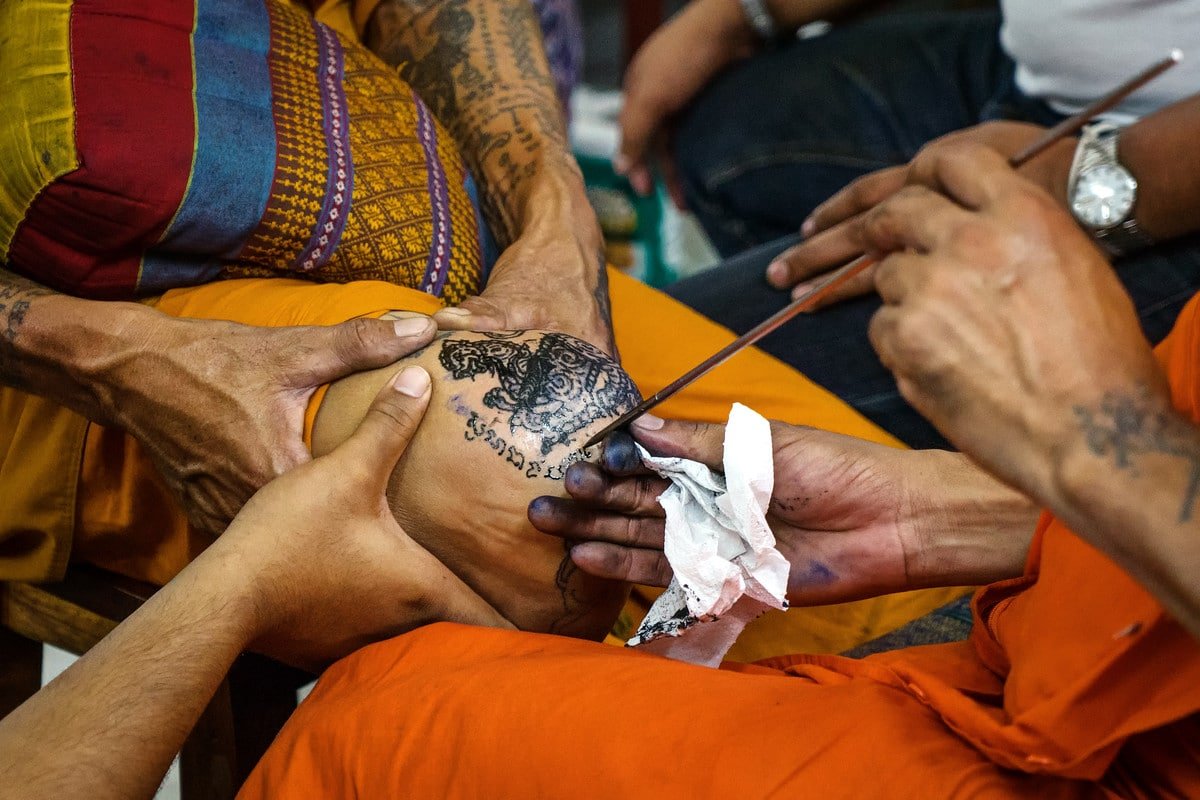 Penetrating the Flesh with Ink Sak Yant Tattoo